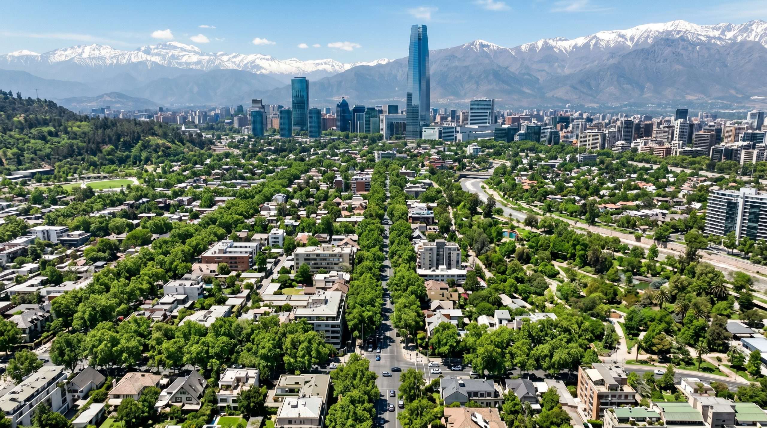 Vista aérea de comunas residenciales de Santiago con áreas verdes y arquitectura moderna